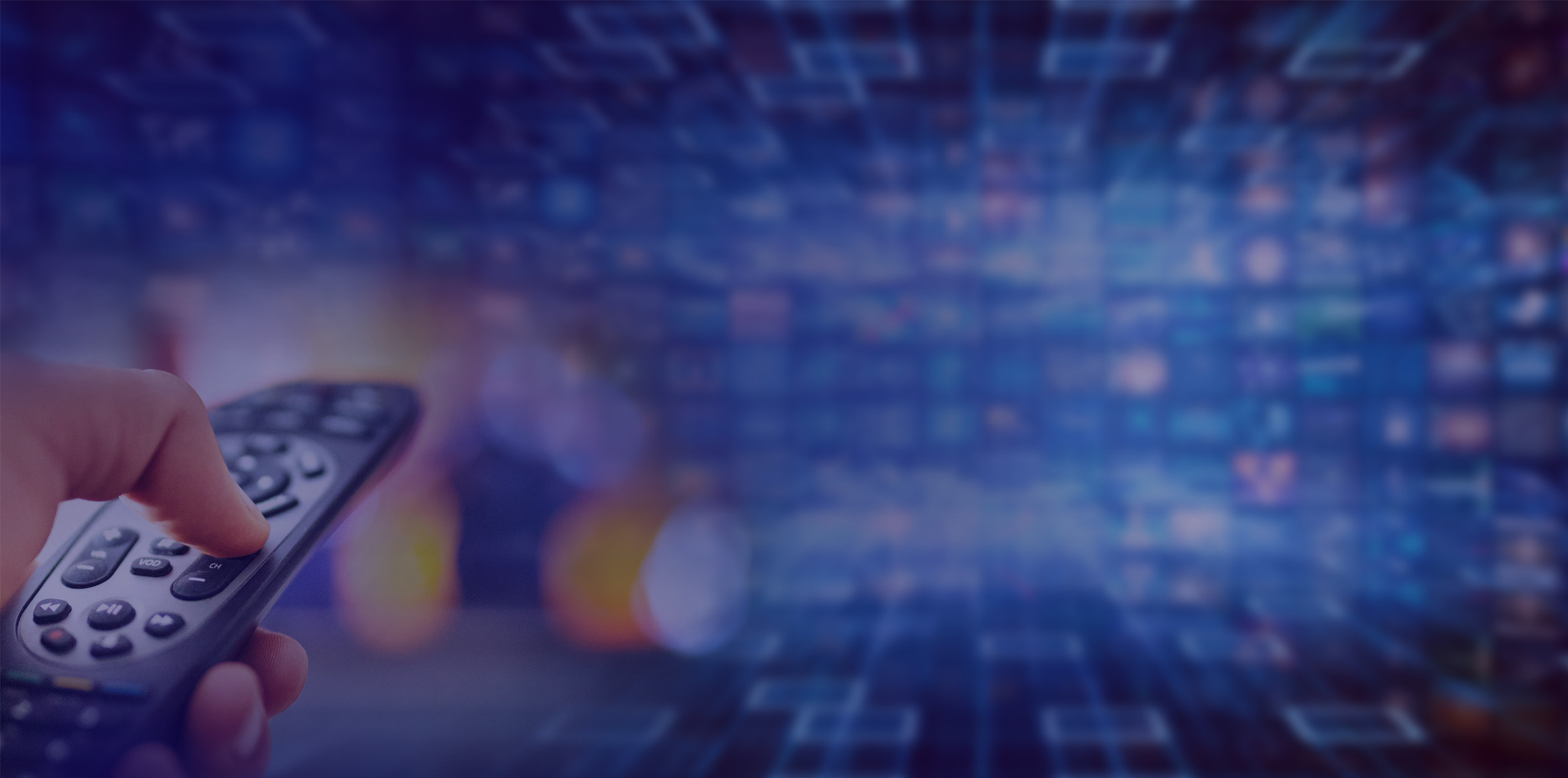 person choosing TV channel