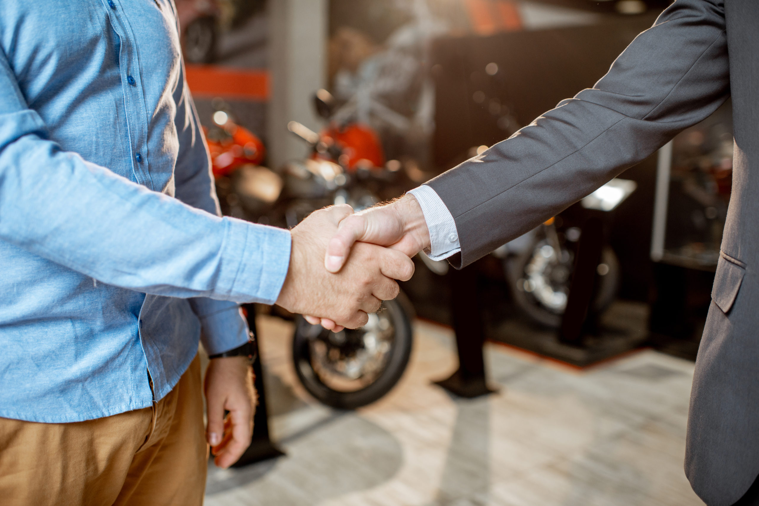 Client shaking hands with a salesman